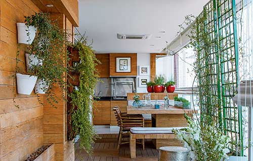 sacada gourmet sofisticada com jardim vertical