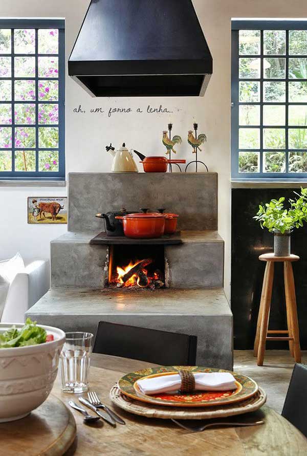 forno a lenha cimento queimado o cimento queimado é um revestimento moderno que pode ornamentar o fogão à lenha e que vai ampliar a aparência campestre da sua cozinha