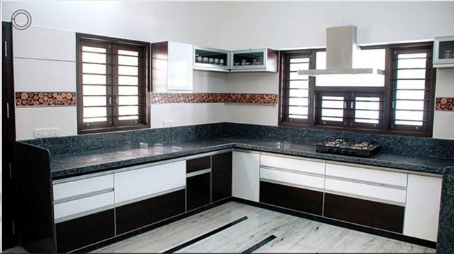 Bancadas de Granito para cozinha Em L 4 Bancada grande de granito preto para cozinhas modernas.