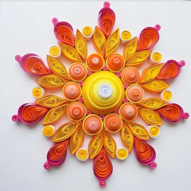 enfeites de Quilling 3 Flor feita usando a técnica.